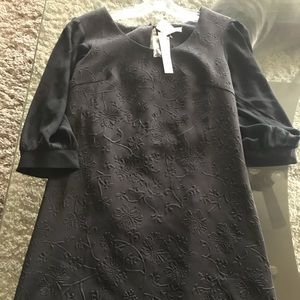 Black dress with pressed print. Classy